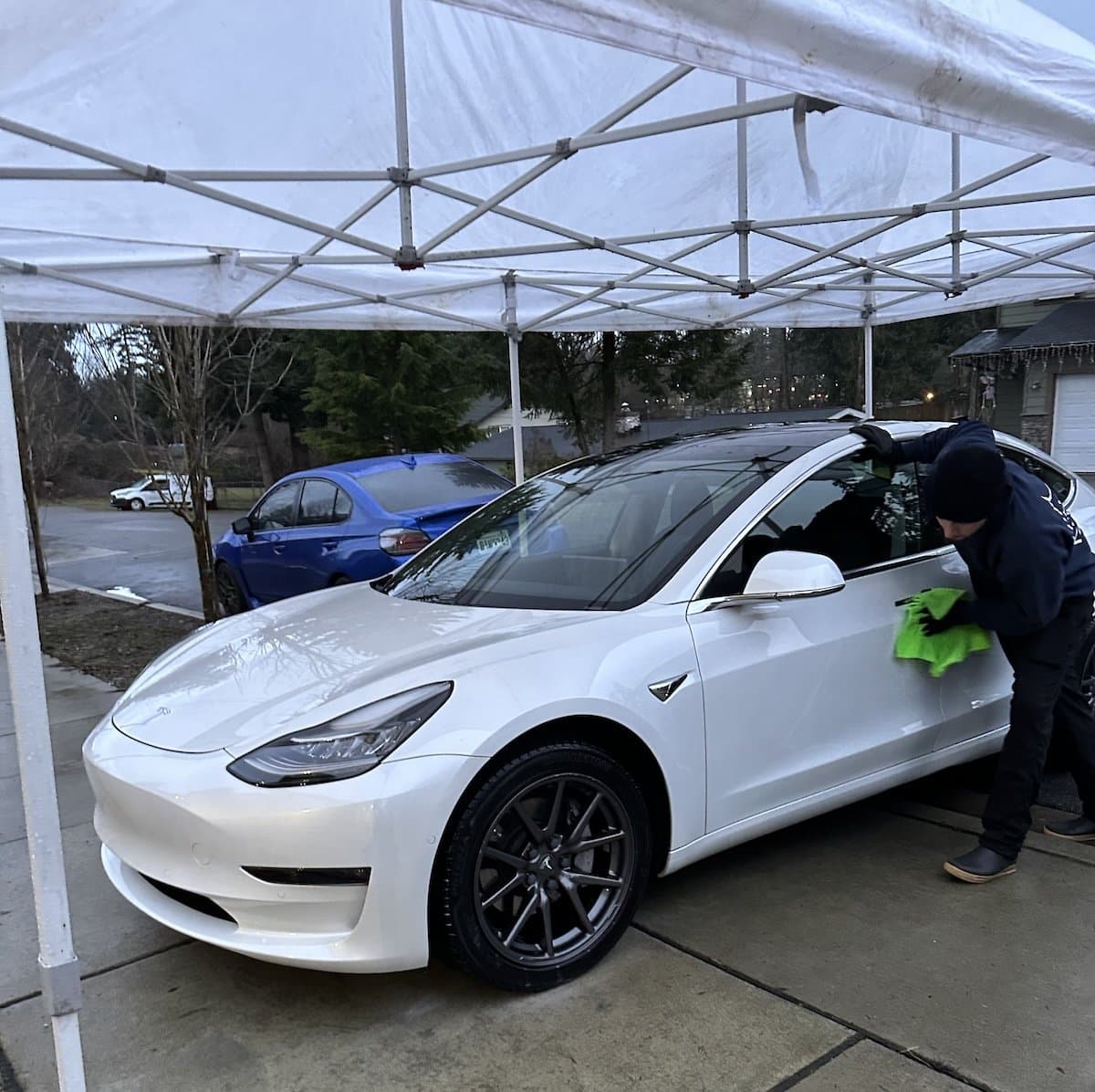 white tesla mobile detail